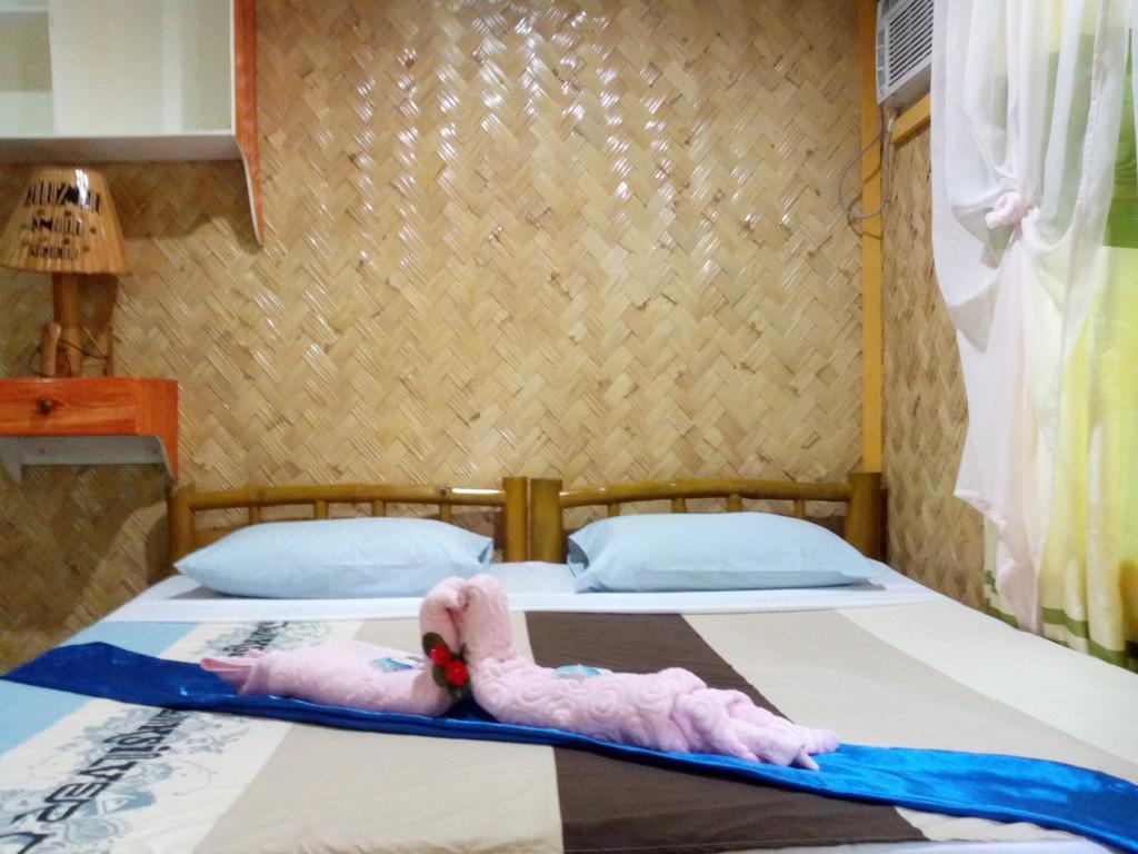 Chariz Inn Ель-Нідо Номер фото